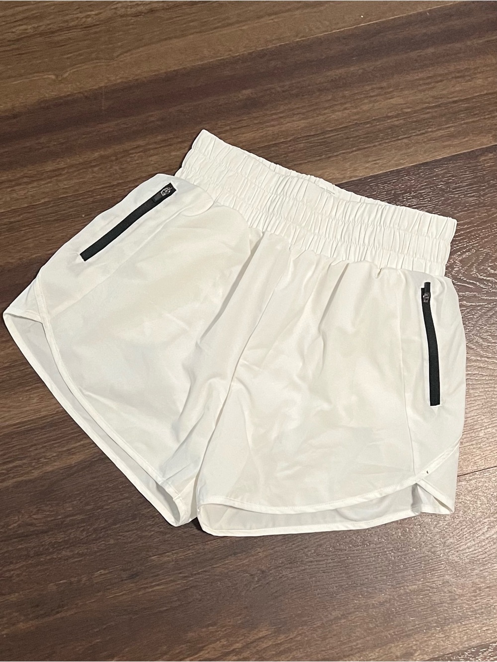 White Athletic Shorts with Black Zip Accents